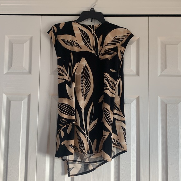 Light new beautiful black and tan low cut blouse. - Picture 4 of 4